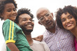 © Connect Images - Grandfather and family at Ipanema Beach, Rio De Janeiro, Brazil