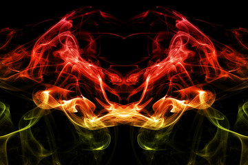 Wall Mural - Colored abstract smoke, isolated on black background. Photo. Acid neon color.