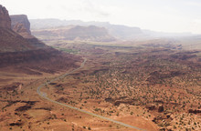 High Angle View Of Distant Rural Road In Valley,  Capitol Reef National Park, Torrey, Utah, USA