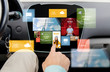 © Syda Productions - close up of male hand media applications in car