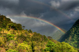 Fototapeta Tęcza - Rainbow on cloudy sky , Sikkim