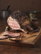 © Connect Images - Christmas dinner. Bone in sirloin joint with peppercorn crust and brandy glaze served with roasted potatoes