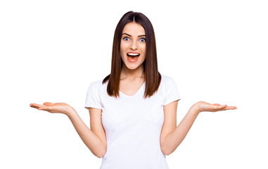 Sometimes it's hard to make the choice. Cropped portrait of a young woman holding copy spaces in both hands and looking at camera while standing against white background