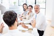 © WavebreakmediaMicro - A businessman is talking to his colleagues