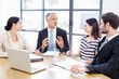 © WavebreakmediaMicro - A businessman is talking and other workers are listening to him
