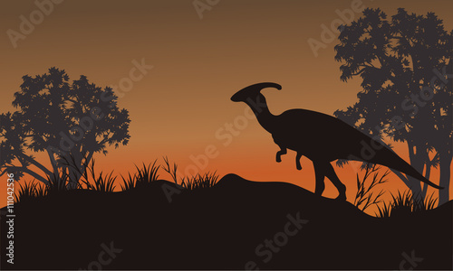 Cuadros en Lienzo Silhouette of one parasaurolophus in hills