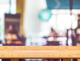 Aufkleber - Empty wooden table and blurred cafe bokeh light background. Mock