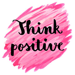 Think positive hand lettering motivational message on watercolor background