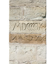 Stone Wall Textures. Medieval Buttress Detail With Roman Numerals.