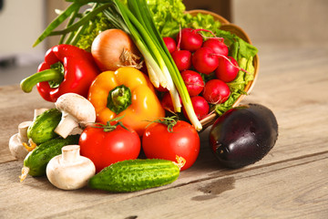 Wall Mural - Vegetables . Fresh Bio Vegetable in a Basket. Over Nature Background