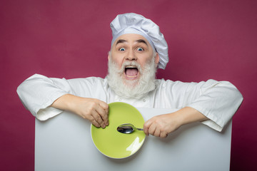 Bearded cook with paper spoon and plate