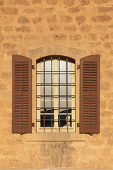 Wall Mural - old window with shutters in stone wall, Jaffa, Tel Aviv, Israel