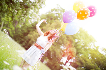 Wall Mural - smile woman with ballons