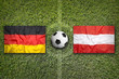 Germany vs. Austria flags on soccer field
