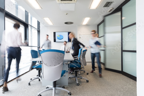 Fotografie, Obraz business people group entering meeting room, motion blur