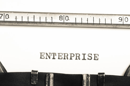  word enterprise  typed on old typewriter