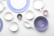 Empty White Dishes On White Background.