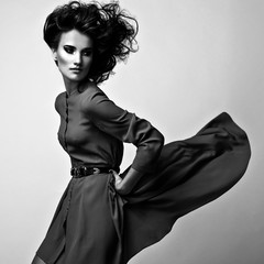 black-white portrait of beautiful fashionable brunette woman.