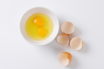 Poster - cracked eggs in a bowl