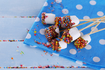 Sticker - Tasty marshmallows with chocolate on sticks, close up