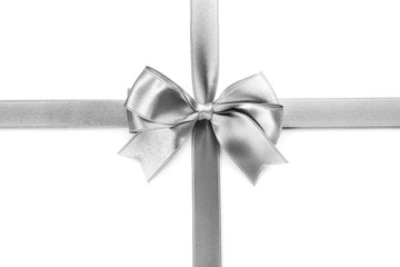 silver silk ribbon with beautiful bow isolated on white background