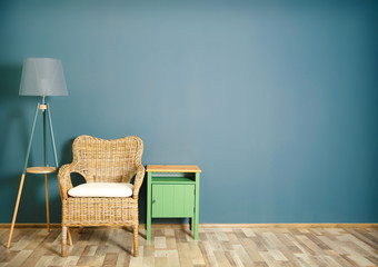 Canvas Print - Room interior with wicker chair on dark grey wall background