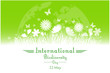 International Biodiversity Day background with flower, butterflies and grass silhouette