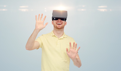 Wall Mural - happy man in virtual reality headset or 3d glasses