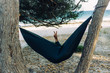 © Sus Pons/ADDICTIVE STOCK - Man lying in a hammock resting