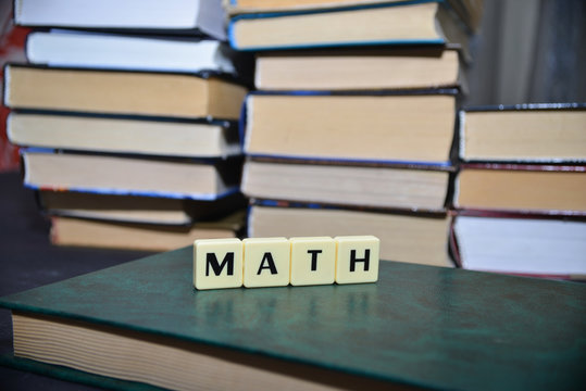 word math near the pile of books