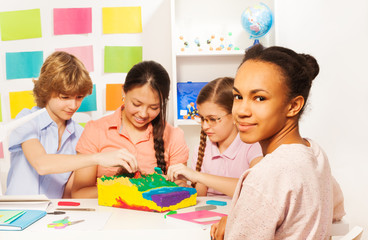 Wall Mural - Students learning geography at the classroom