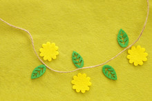 Yellow Green Textile Background Of Felt With Flower And Leaves