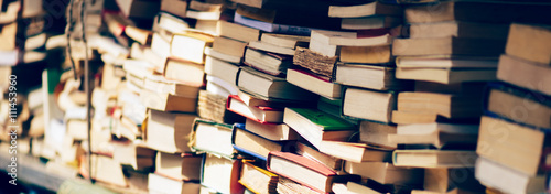 Stack of books at the bookshop Poster Mural XXL