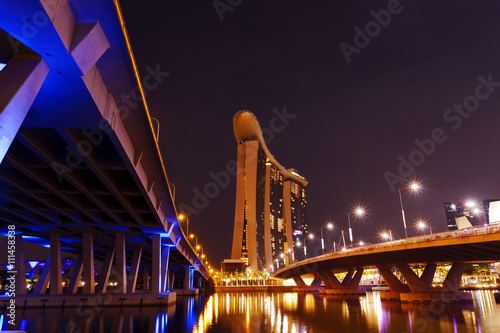Obraz na plátne Incredible bridges in Singapore at night down by the bay