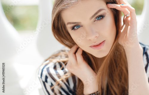 Portrait Of A Happy Woman In Spring City Blonde Long Straight