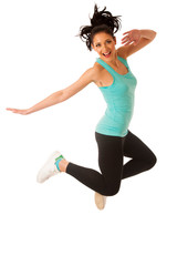 Happy fit and slim woman dancing and jumping isolated over white