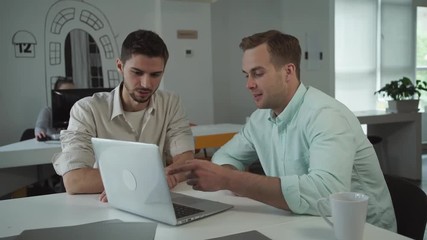 Aufkleber - Men are brainstorming for search ideas future  business development.Young professional team of coworkers.  