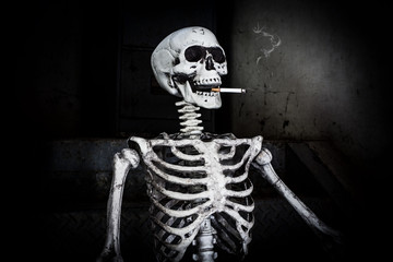 still life smoking human skeleton with cigarette, people smoke cigarette look like trying to commit 