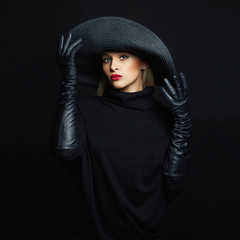 Sticker - Beautiful woman in hat and leather gloves. halloween witch