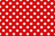Red polka dot background.