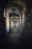 Fototapeta Desenie - Old abandoned tunnel in the underground wine cellar