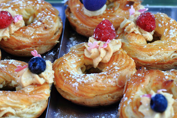 Canvas Print - cream puff with raspberries and blueberries