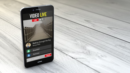 Wall Mural - smartphone with video live application over white wooden backgro
