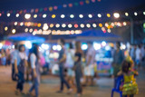 Fototapeta  - blurred night market walking street in Thailand