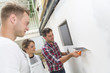 © Atelier 211 - Young apprentice with professional plasterer