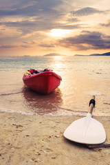 Wall Mural - Kayak on the beach in sunset