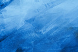 Fototapeta  - Textured blue painted background