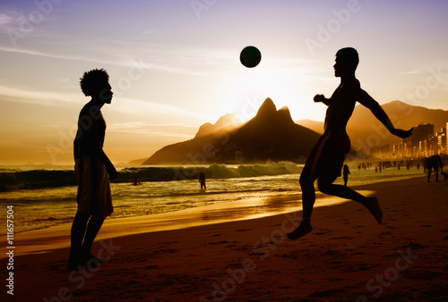 Obraz na plátně Two soccer players at beach at Rio de Janeiro