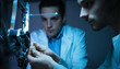 © StockPhotoPro - Engineering team working on a 3D printer