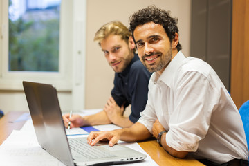 Business people at work in their office